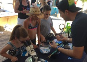 RECOVER took their science out of the lab for kids and parents to experience firsthand at Tortuga Musical Festival’s Conservation Village. Photo by RECOVER.
