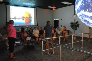 K-12 educators learn about the teaching potential of Science on a Sphere at a professional development workshop. (Photo by John Williams)