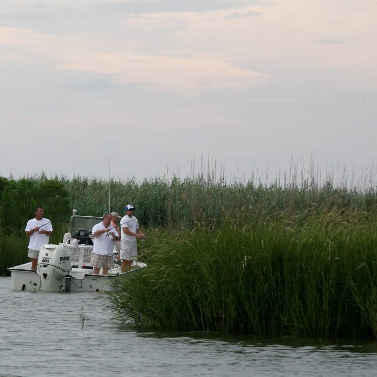 Fishermen in the Louisiana Marsh. (Credit: Jay Ritchie, 2008)