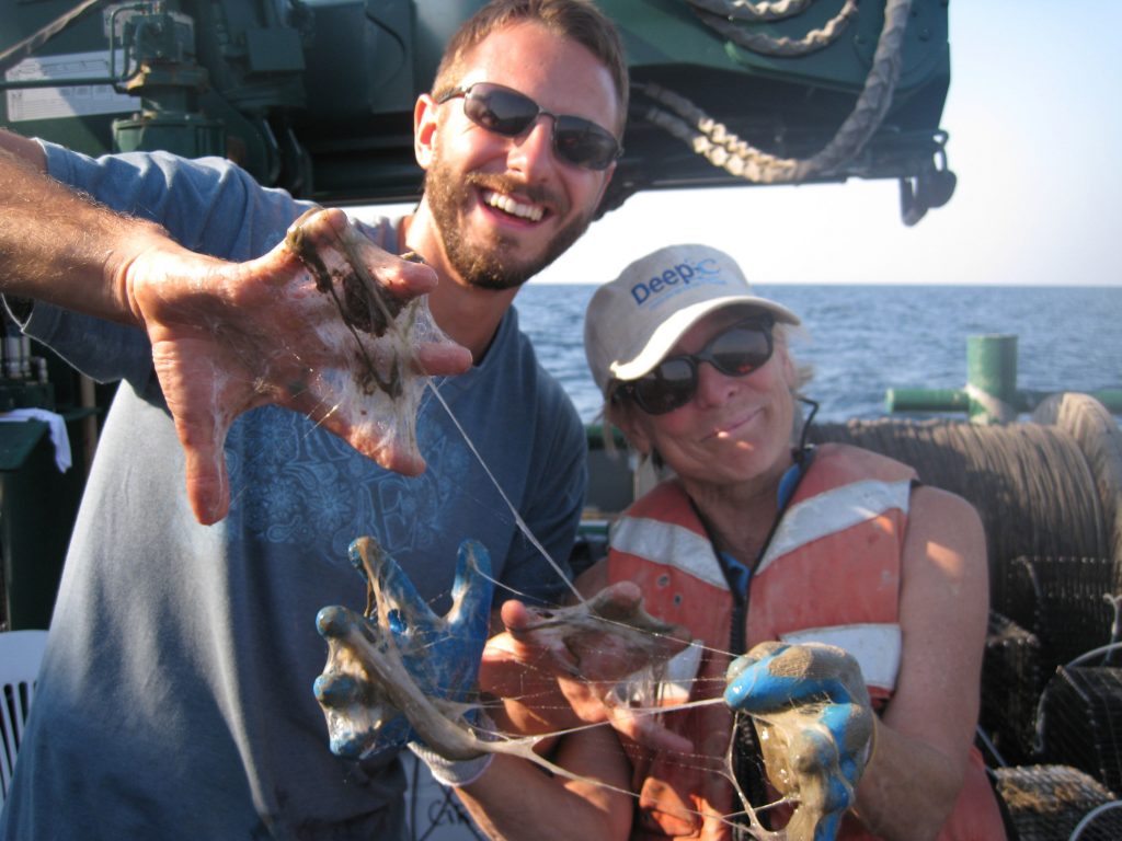 Dr. Felicia Coleman, right, blogged about an encounter with Hagfish slime shown here during the recent Deep-C Fisheries Cruise on the RV Weatherbird II. Chris Malinowski on left. (Photo credit: Deep-C)