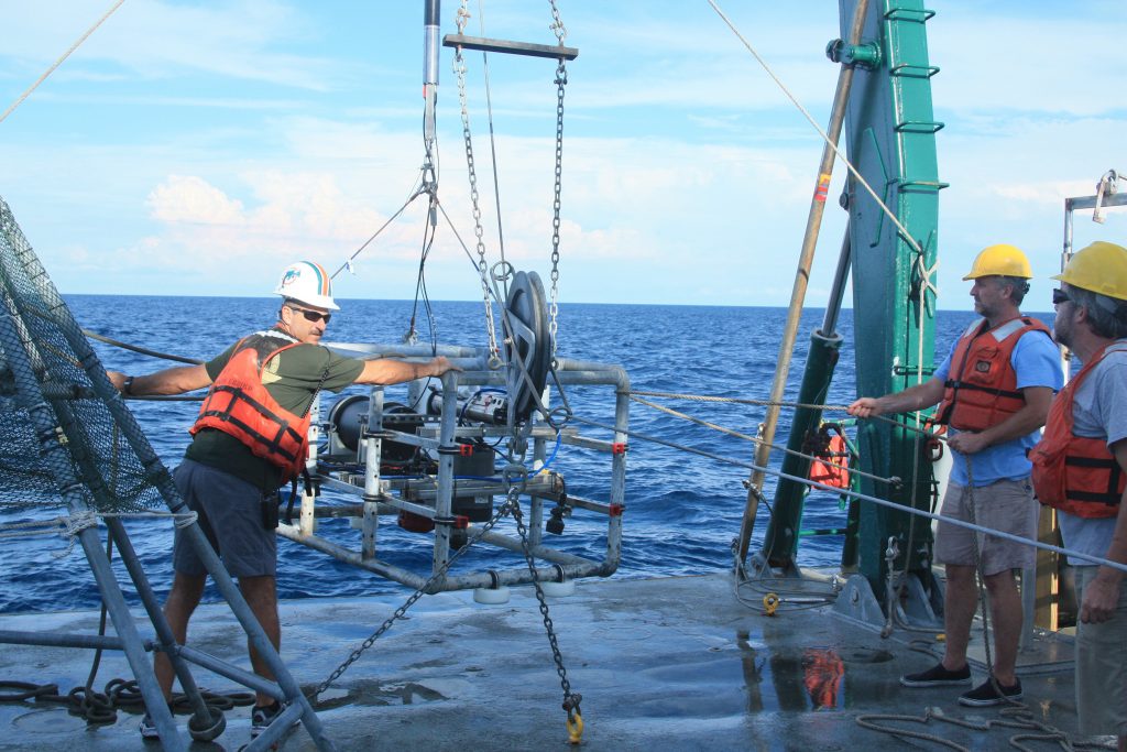 MILET goes over the stern of the RV Weatherbird II to start a deep-sea floor survey. (Photo credit: Ian MacDonald)