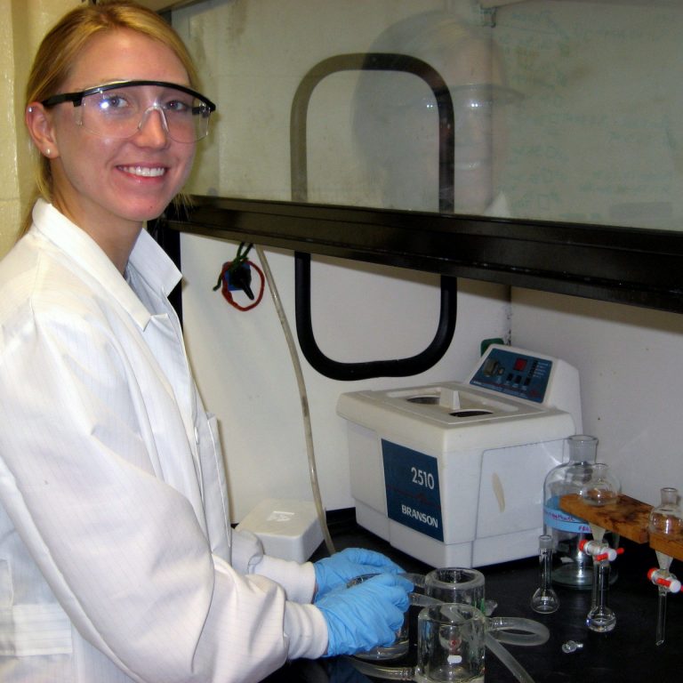 IMG_0795a_2 High school graduate Amy Olson extracts oil sample after exposure to simulated sunlight. Olson worked in UNO's 2012 summer outreach program for high school students and undergraduates. This GoMRI project will include both undergraduate and high school students in summer research on the effect of sunlight on oil compounds.
