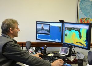 Dr. Eric Chassignet, Director of Deep-C, tracks the progress of the consortium’s SailBuoy using computer models incorporated into the Deep-C Atlas. The SailBuoy is an unmanned ocean observation vessel on a two-month mission in the Gulf of Mexico. (Photo by Tracy Ippolito)