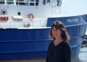 Dr. Nancy Rabalais, Director of CWC, stands next to the Louisiana Universities Marine Consortium’s RV Pelican. Many scientists use this vessel to conduct research in the Gulf of Mexico. (Photo by Nicole Cotton)