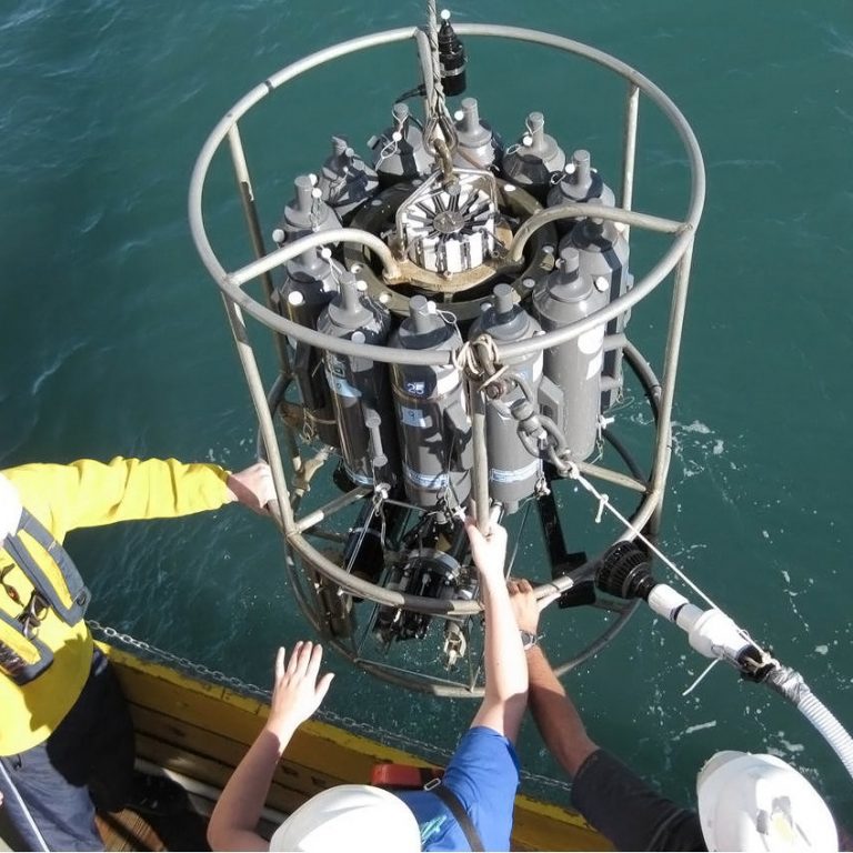 Dr. Cai and his research team on the RV Pelican deploy a CTD/Rosette water sampler to collect water samples in the Gulf of Mexico. (Photo provided by Wei-Jen Huang/UGA)