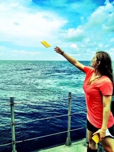 Laura Harred, on a NOAA Mechanisms Controlling Hypoxia cruise, releases driftcards. The Chief Scientist for this cruise was Dr. S.F. DiMarco. (Photo courtesy Ruth Mullins-Perry and GISR)