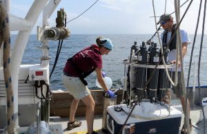 Graduate student Sara Weber (Georgia Tech and ECOGIG) and marine technician Alex Ren (LUMCON) aboard the R/V Acadiana recover a CTD cast used to collect samples around the Hercules rig. Photo credit: Terry Wade (TX A&M and GISR)