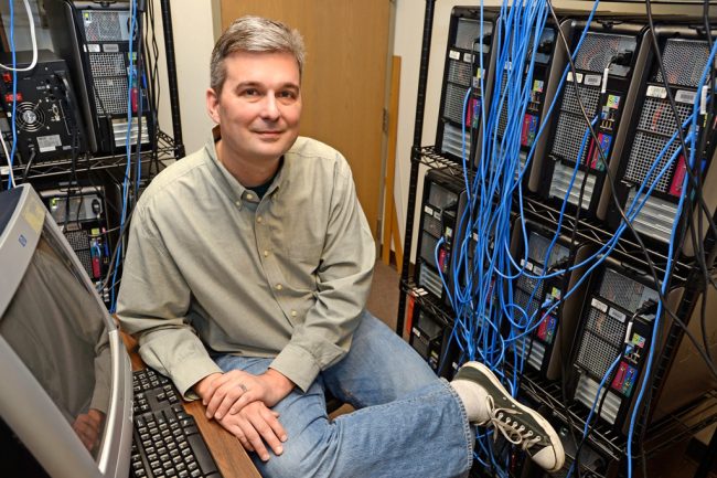 Scientist Hank Ashbaugh of Tulane University received the Helmholz Award for his research on the properties of water and aqueous solutions, in particular, the hydrophobic effect. (Photo ©2013 PBurch/Tulane Publications)