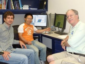 The research team models how an oil slick changes air/sea coupling, resulting in motion of the slick. Lead author Dr. Yangxing Zhang (center) with coauthors Paul Hughes (left) and Prof. Mark Bourassa (right). Photo courtesy of Deep-C.