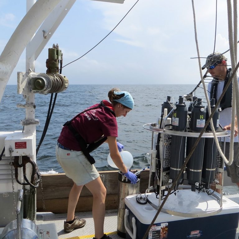Acadiana-114-WEB Sara Weber and marine technician Alex Ren aboard the RV Acadiana recover a CTD cast used to collect samples around the Hercules rig. (Photo credit: Terry Wade)
