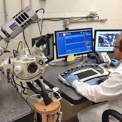 C-MEDS_LabMicroscopePic University of Rhode Island Chemical Engineering Ph.D. student Amitesh Saha uses a cryogenic scanning transmission electron microscopy to image crude oil-in-water emulsions. (Photo provided by Arijit Bose)