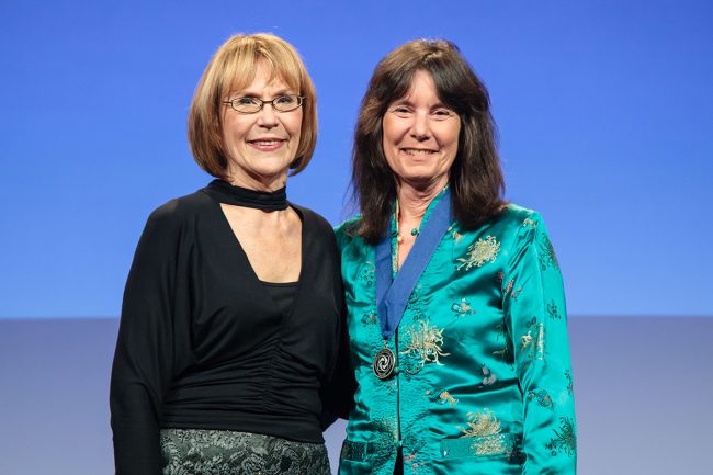 Nancy Rabalais (R) receives her AGU Fellow honor along side the newly-elected AGU President, Margaret Leinen (L). (Copyright © Gary Wagner, All Rights Reserved, 2013. Photo used with permission)