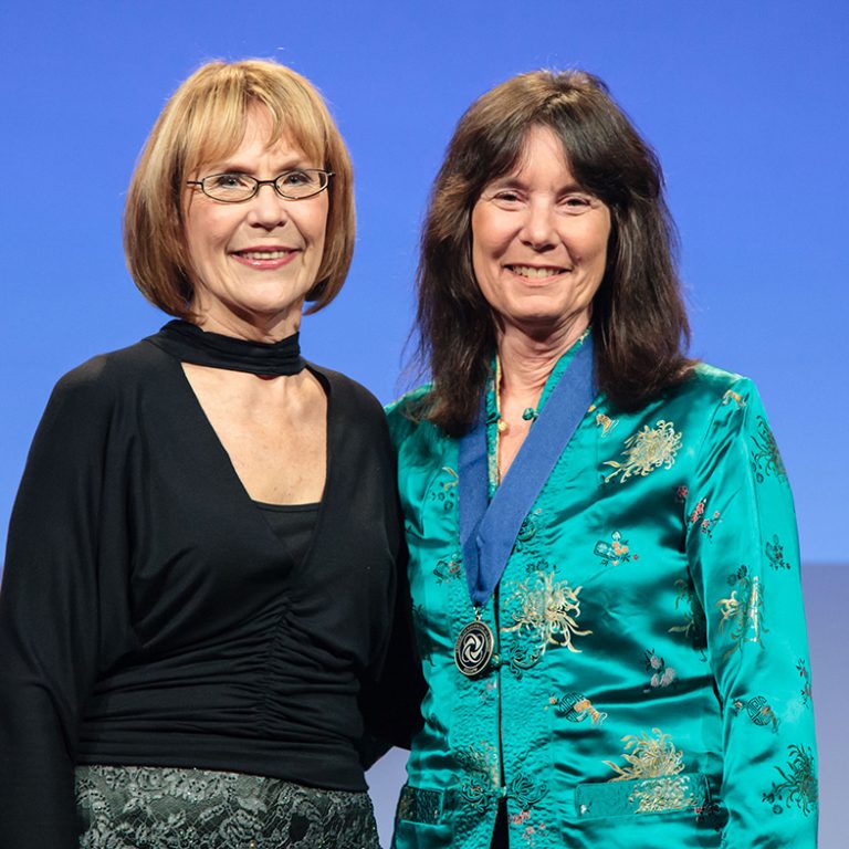 Honors Ceremony Nancy Rabalais (R) receives her AGU Fellow honor along side the newly-elected AGU President, Margaret Leinen (L). (Copyright © Gary Wagner, All Rights Reserved, 2013. Photo used with permission)