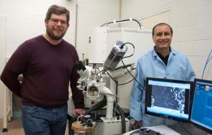 CLEAN SLATE: URI engineering assistant professor Geoff Bothun, left, and professor Arijit Bose are developing new technologies for cleaning oil spills. (COURTESY CHRIS BARRETT)