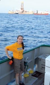 Samantha Joye stands on the deck of the research vessel Walton Smith during her 2010 research cruise to investigate the immediate impacts of the oil spill. (Photo courtesy of the University of Georgia)