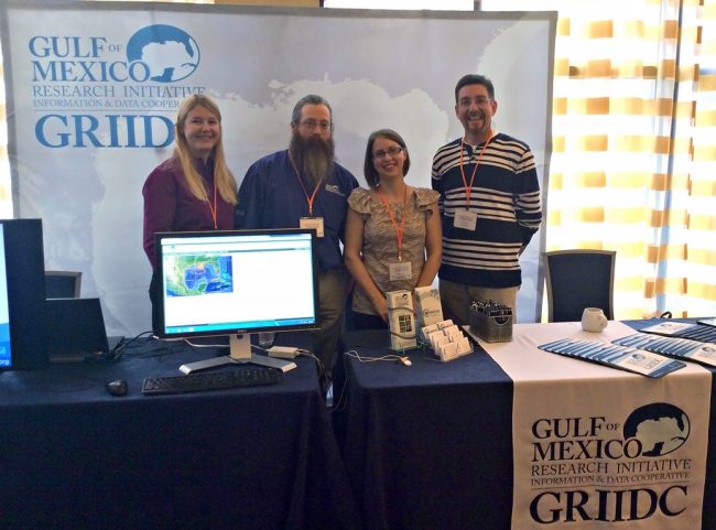 GRIIDC-Booth-2014 GRIIDC team members Lauren Showalter, William Nichols, S. Ellis, and David Reed at their booth at the Gulf of Mexico Oil Spill and Ecosystems Science conference in Mobile, Alabama this past January. (Photo provided by GRIIDC)