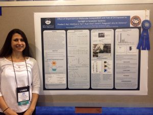 Phoebe Ray, Graduate Research Assistant in the Department of Chemistry at University of New Orleans, stands next to her poster at IOSC 2014. She won an award in the Science and Technology Category for her presentation. (Photo credit: Megan Gibney, Consortium for Ocean Leadership)
