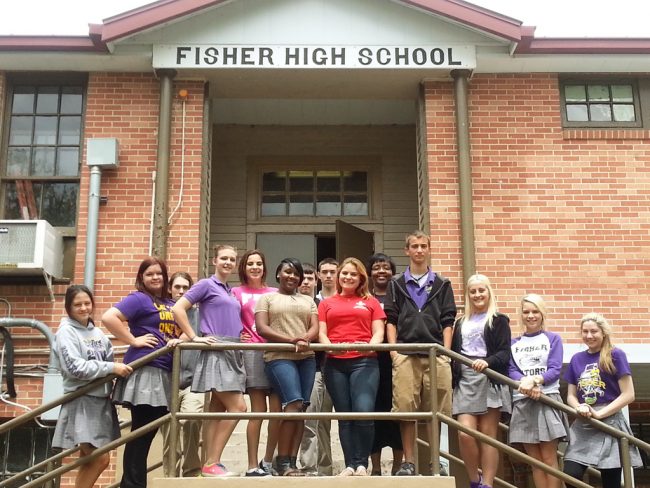 C-MEDS_FisherHighSchool_Y At the top center rail, undergraduate students Karry Wright (L) and Mary Osetinsky (R) gather with Jones’ high school science class in Lafitte, Louisiana. (Photo by Bennetta Horne)