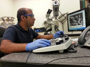 Amitesh Saha uses a Cryogenic Scanning Electron Microscope to investigate the distribution of particles on an oil drop surface in an emulsion. (Provided by Saha)