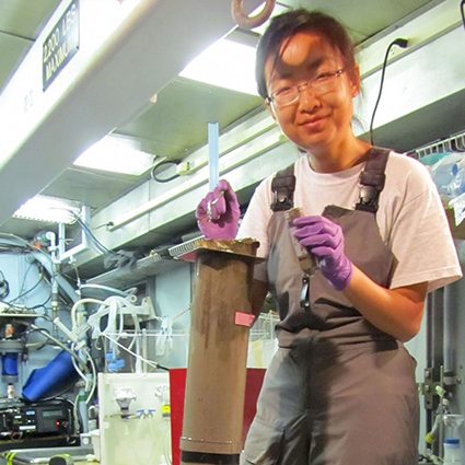 ECOGIG_TintingJoe-cruise-427-FEATURED In 2011 onboard the R/V Endeavor, Tingting Yang with the University of North Carolina at Chapel Hill works in the vessel’s web lab with sediment and water samples taken from the Gulf of Mexico. (Photo provided by T. Yang)