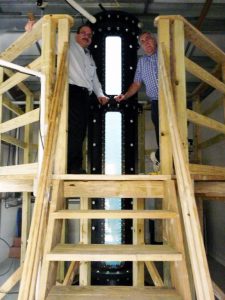 Joe Katz (left) and Ed Buskey (right) stand at the top of the mesocosm tank at Johns Hopkins University. (Photo by: Brad Gemmell, UTMSI)