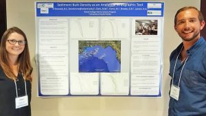 Undergraduate students, and even one high-school student, presented posters during the evening reception. In this photo, Morgan Forni and Brady O’Donnell from Eckerd College present their work on Gulf sediment. (Photo by: Brittany Pace)
