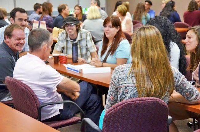 Students, as well as chemical oceanographer David Hollander (far left), got a kick out of hearing marine chemist Chris Reddy (to the right of Hollander) share some of his research mishaps. (Photo by: Kris Suchdeve)