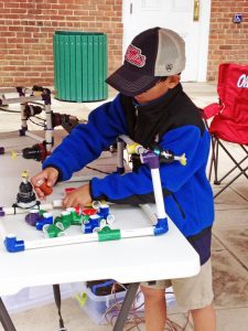 The University of Mississippi offered young scientists an opportunity to make their own ROVs before the game. (Photo credit: Michelle Edwards)