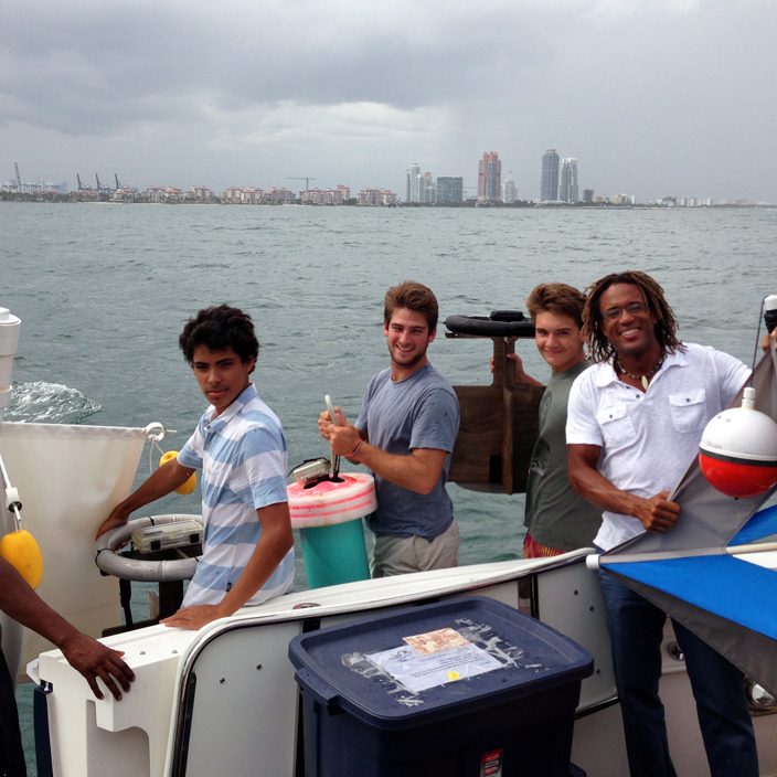 Teens from StreetWaves deploying a variety of CARTHE drifters near Miami Beach. (Provided by: CARTHE)