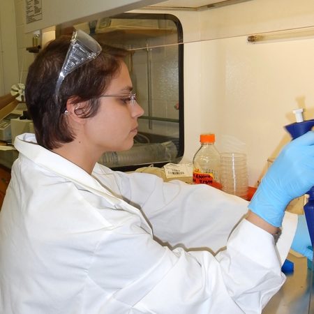 Sarah transfers DNA samples from single-cell organisms in the lab at University of West Florida. (Photo credit: Richard Snyder)