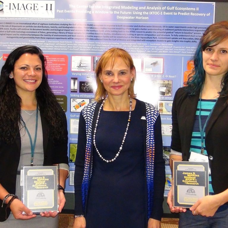 Lindsey and Kristina receive their awards from Sherri Goodman, Consortium for Ocean Leadership President & CEO.