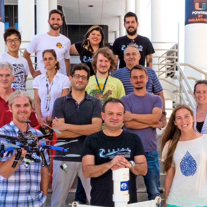 The CARTHE and Waterlust teams involved with the winning video include (front row) Patrick Rynne, Tamay Özgökmen, Fiona Graham, (second row) Ed Ryan, Guillaume Novelli, Cedric Guigand, Laura Bracken, (3rd row) Shitao Wang, Josefina Olascoaga, Nathan Laxague, Mike Rebozo, (back row) Conor Smith, Sharon Chinchilla, Milan Curcic (Photo credit: Fiona Graham)