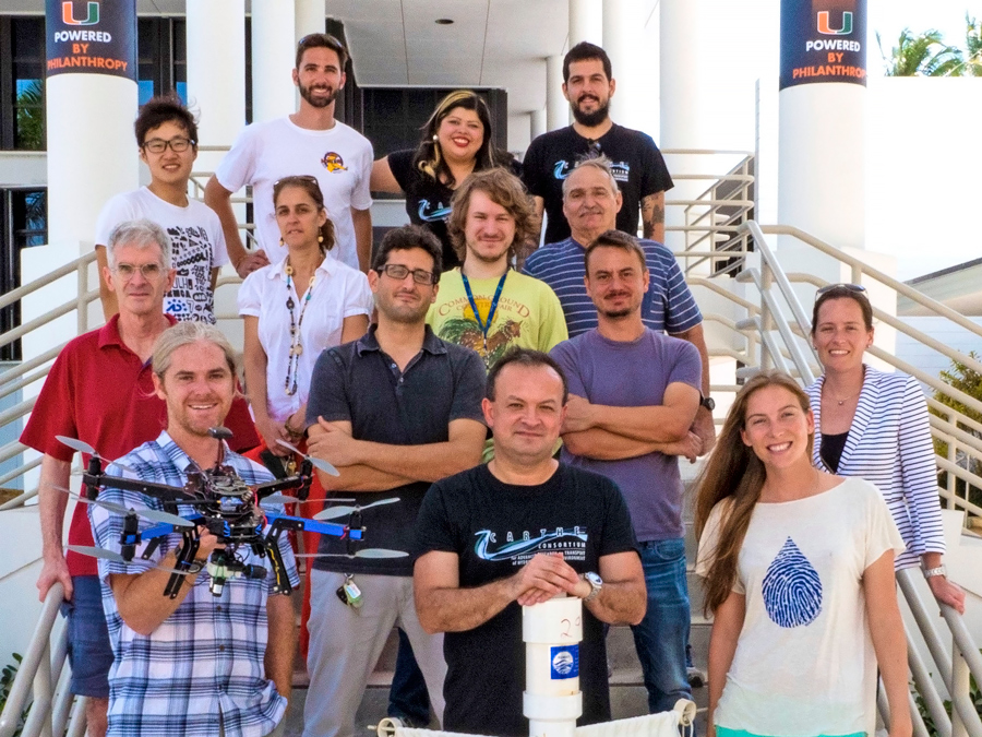 CARTHE_DroneVideoTeam-FEATURED The CARTHE and Waterlust teams involved with the winning video include (front row) Patrick Rynne, Tamay Özgökmen, Fiona Graham, (second row) Ed Ryan, Guillaume Novelli, Cedric Guigand, Laura Bracken, (3rd row) Shitao Wang, Josefina Olascoaga, Nathan Laxague, Mike Rebozo, (back row) Conor Smith, Sharon Chinchilla, Milan Curcic (Photo credit: Fiona Graham)