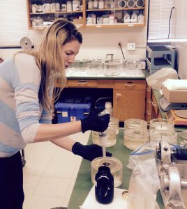 Lab manager Julia Sweet prepares treatments for the rolling tanks experiments. (Photo provided by Uta Passow)