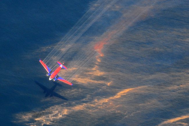 uscoastguard_1095185 The crew of a Basler BT-67 fixed wing aircraft release oil dispersant over an oil spill from the mobile offshore drilling unit, Deepwater Horizon, off the shore of Louisiana, May 5, 2010. (U.S. Coast Guard photo by Petty Officer 3rd Class Stephen Lehmann)