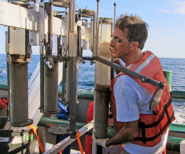 Hasting_IMG_1652 Using a multi-core sediment sampler, David Hastings recovers sediment cores from the Northern Gulf of Mexico. (Photo provided by D. Hastings)