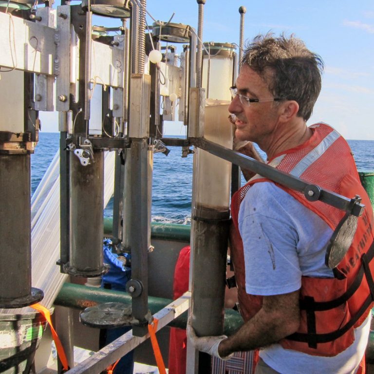 Hasting_IMG_1652 Using a multi-core sediment sampler, David Hastings recovers sediment cores from the Northern Gulf of Mexico. (Photo provided by D. Hastings)