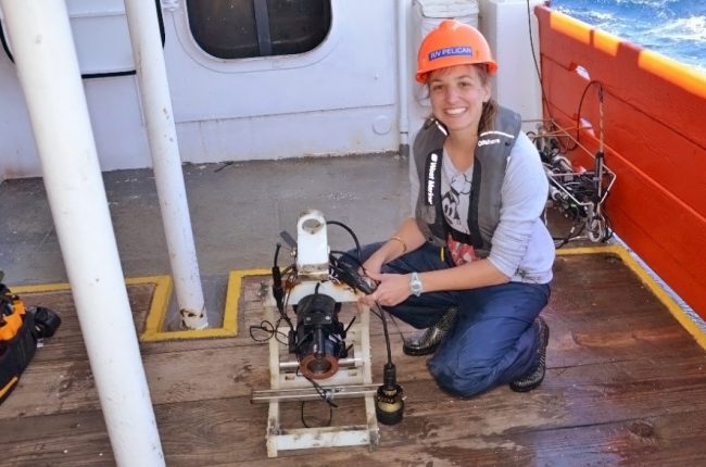 ScholarJohansen_CameraSystem Caroline Johansen displays one of her camera systems that was lost for 9 months and found after three days of searching the seafloor. (Photo provided by Johansen and taken by a crew member of the R/V Pelican)