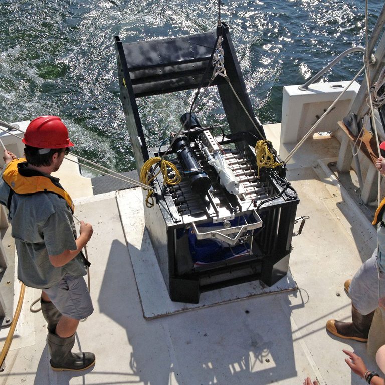 Hernandez_JohnRansom-DrFilman_plankton USM graduate student John Ransom (left) and postdoctoral researcher Dr. Jesse Filbrun (right) prepare to deploy the multinet sampler during a cruise off the coast of Alabama in July 2013. (Credit: USM Fisheries Oceanography and Ecology Lab)