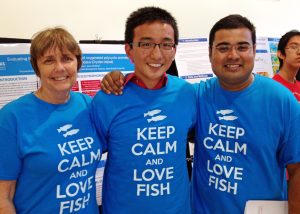 Subham (right) poses with Anne McElroy (left) and a high school summer research fellow, who enjoyed working with Subham and McElroy so much that he created matching t-shirts for the group. (Provided by Anne McElroy)
