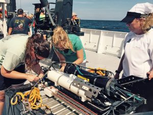 Researchers aboard the RV Point Sur prepare the Mininess for a plankton tow during AUV Jubilee. The Mininess is a small towed multiple net system for collecting zooplankton samples in the water column. (Photo provided by CONCORDE)