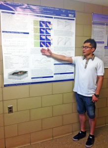 Bicheng displays a poster detailing his research at Pennsylvania State University. Bicheng and his advisor Dr. Marcelo Chamecki created this poster, which was presented at the 2015 Gulf of Mexico Oil Spill and Ecosystem Science Conference. (Provided by Bicheng Chen)