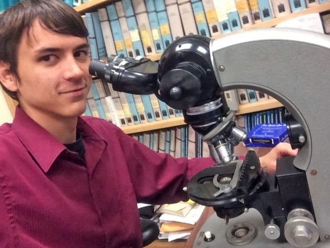 Deep-C_Cruz_MicroscopeIMG_0537-web Jarrett Cruz examines nannoplankton samples under a microscope. (Photo provided by Jarrett Cruz)