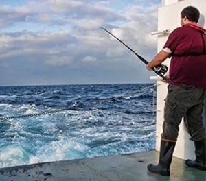 Jordan uses down time on a GISR research cruise to catch fish for dinner. (Photo courtesy of GISR)