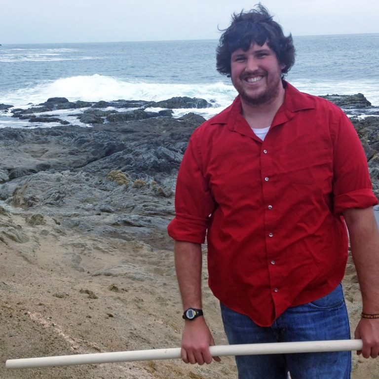 Jordan Young takes water samples in his new position at the University of California at Davis’ Bodega Marine Laboratory. (Photo courtesy of Jordan Young)