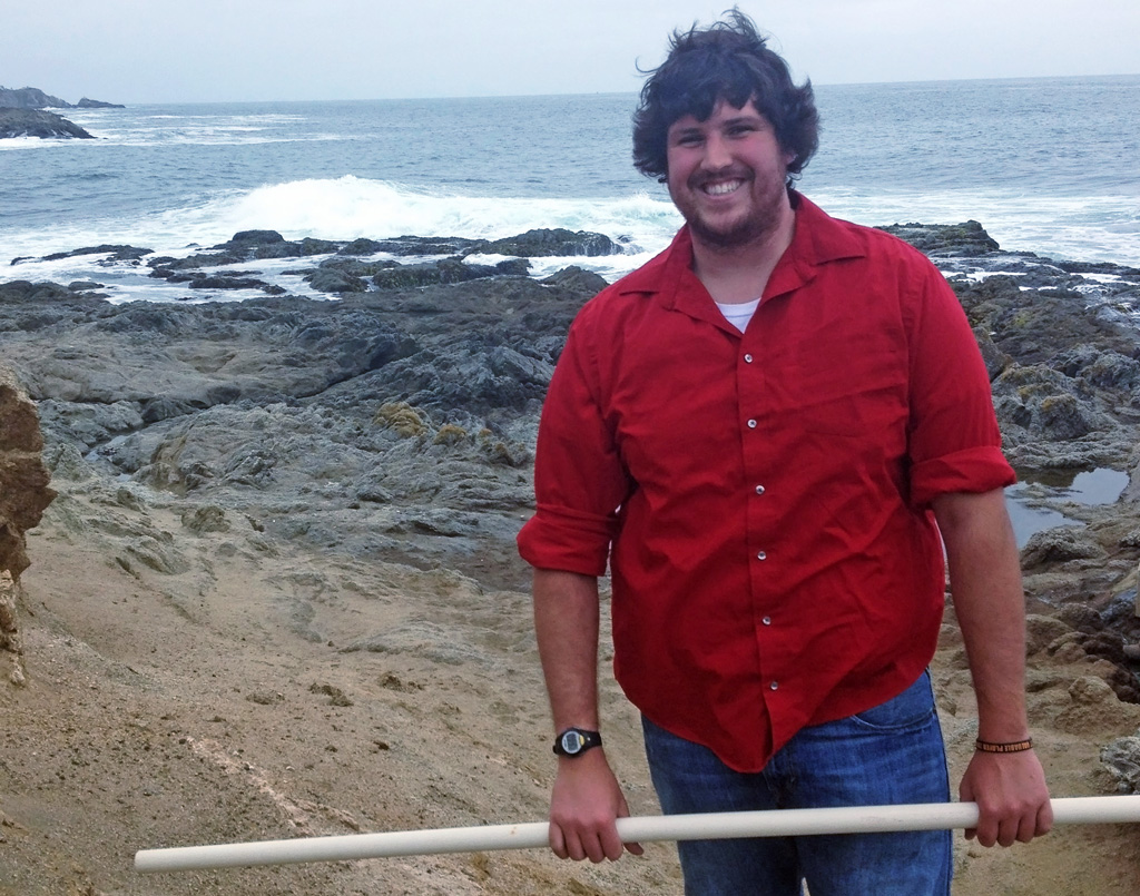 JordanYoung_GISR_WaterSample-FEATUED Jordan Young takes water samples in his new position at the University of California at Davis’ Bodega Marine Laboratory. (Photo courtesy of Jordan Young)