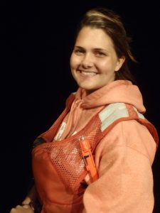 Emily, wearing the safety gear sometimes necessary for fieldwork, hopes her research will contribute to a better understanding of how Gulf oil interacted with larval fish. (Photo provided by Emily Chancellor)