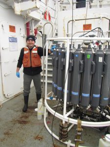 Dr. Kai Ziervogel on board the R/V Endeavor with the CTD that had a turbidity sensor. The ECOGIG science team also used a deep-sea particle camera to observe the bottom nepheloid layers and macroaggregates near the wellhead after Hurricane Isaac and used samples collected for laboratory analyses. (Photo provided by K. Ziervogel)