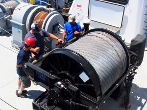 To collect samples at deep depths, researchers use long lengths (2.5 miles!) of conducting cable on the R/V Point Sur. (Photo provided by DEEPEND)