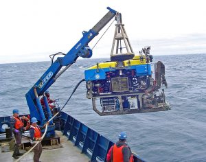 The remotely operated vehicle (ROV) Jason II being deployed from R/V Atlantis. The researchers use the ROV to position the acoustic scintillation moorings in specific locations to capture vertical upwelling flows. (Photo by Daniela Di Iorio)